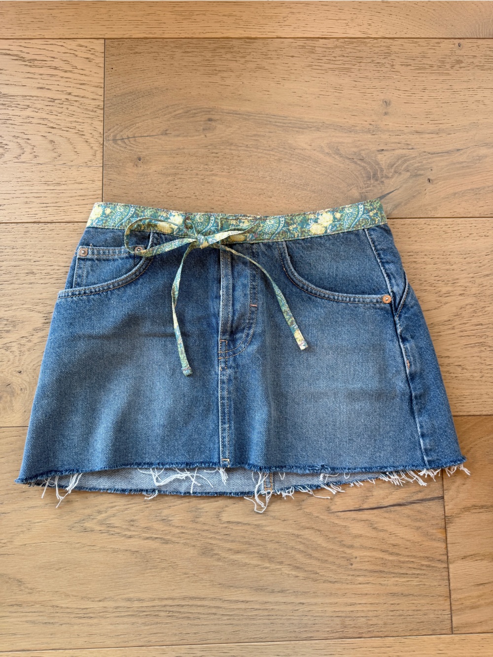 We The Free Denim Mini Skirt with Green Paisley Tie Waist